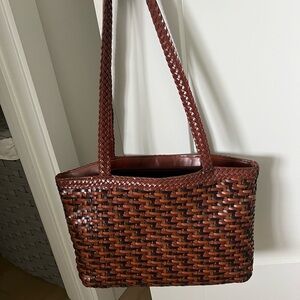 Brown leather-like shoulder tote bag. Can also be used to carry laptop.
